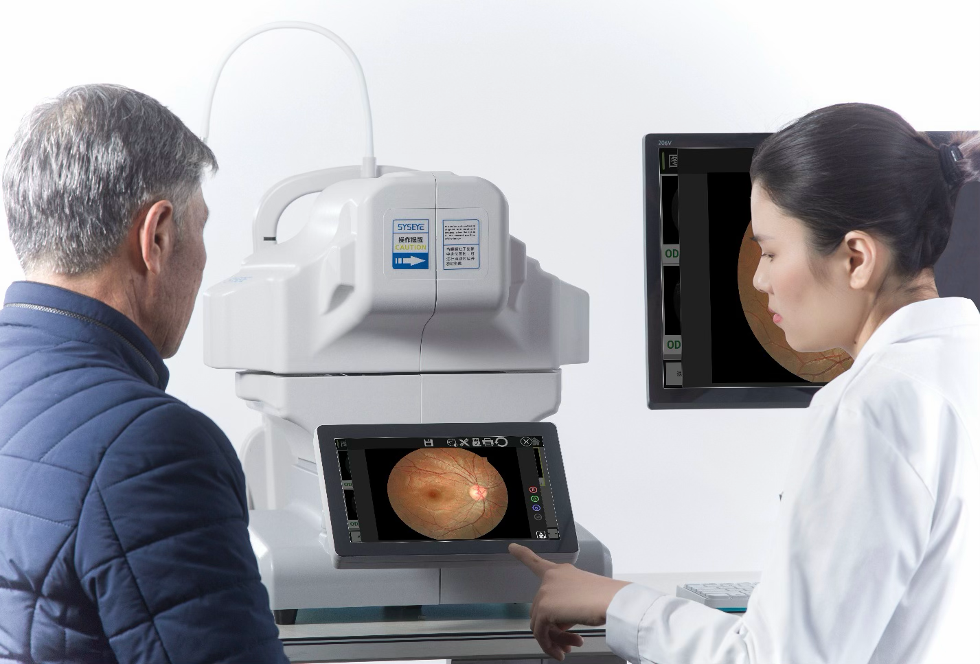 Optometrist imaging a patient's retina with a SYSEYE desktop fundus camera